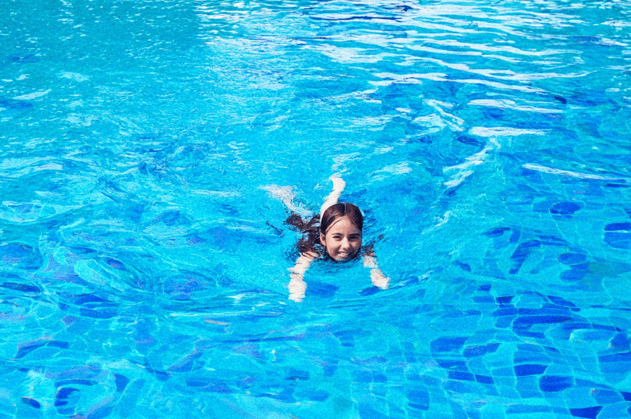 Girl swimming in a pool